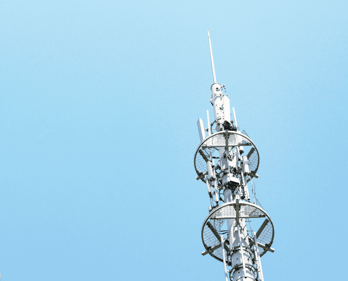 red-and-white-tower-of-communications-with-a-lot-of-different-antennas-under-blue-sky-and-clouds 1.png